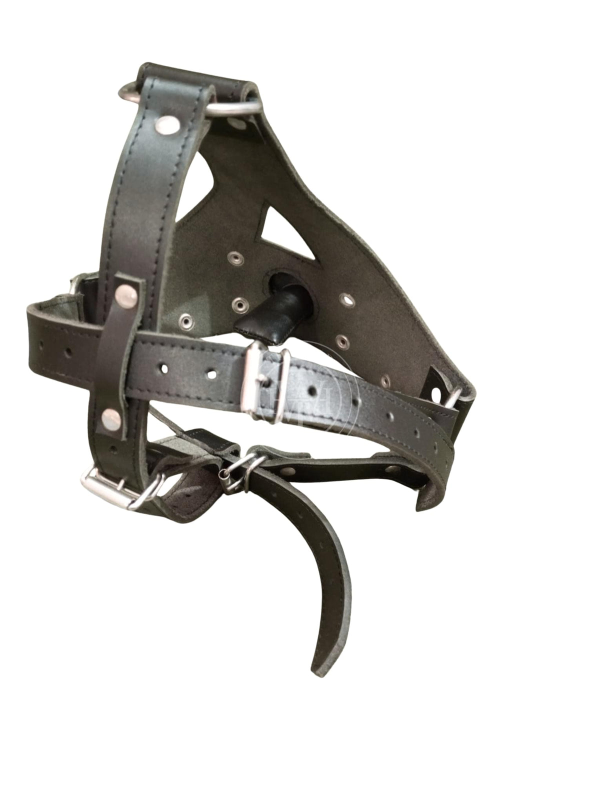 Side view of submissive wearing BDSM Muzzle With Gag