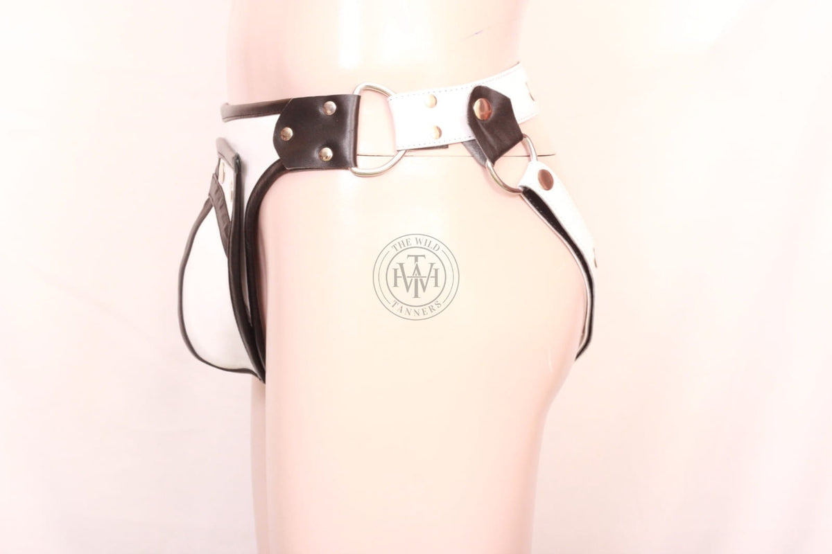leather jockstrap with removable pouch, side view of white leather jockstrap with black piping, d-rings and rear snap strap