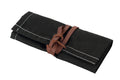 Black canvas tool roll, foldable storage pouch, roll-up tool bag, canvas utility roll, leather strap closure pouch, compact tool organizer, handmade tool holder, artisan tool wrap, canvas pouch with leather tie, heavy-duty canvas tool roll, cotton canvas storage case, durable fabric tool organizer, multi-pocket tool roll, portable tool wrap, hand tool storage pouch, tool kit roll for professionals, brush or tweezer roll case, minimalist tool pouch, rustic style tool roll, black pouch with white stitching,