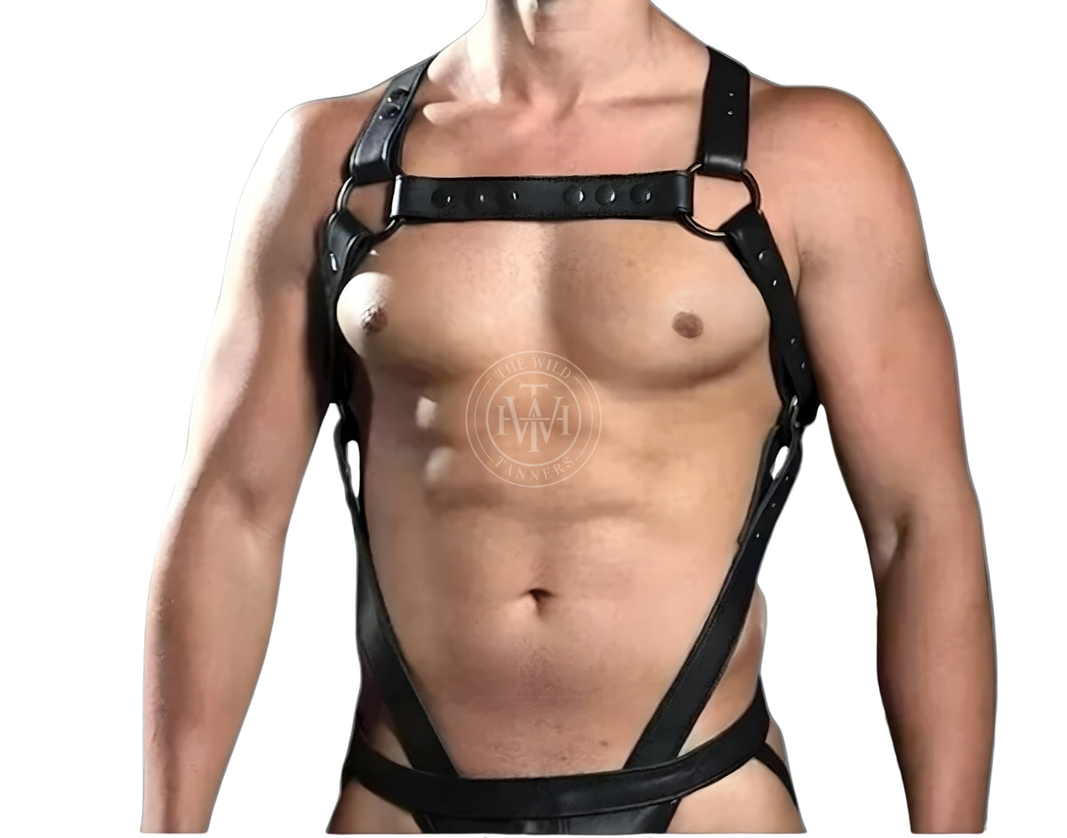 men's full-body leather harness with attached jockstrap, black leather harness with rivet chest bar, o-rings and connector straps running to jockstrap