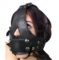 Front view of submissive wearing BDSM Muzzle With Gag
